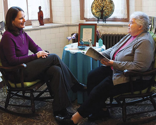 Vision 2018 Lesher The passion of youth meets the wisdom of age Sister Michelle Lesher, S.S.J. (left) talks with Sister Roberta Archibald, S.S.J.